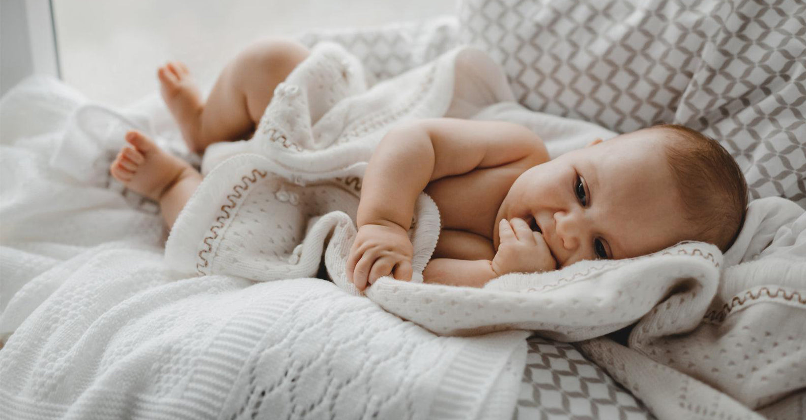 When Can Babies Safely Sleep with a Blanket?